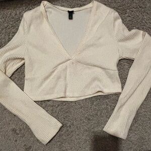 Cream V-Neck Ribbed Knit Top